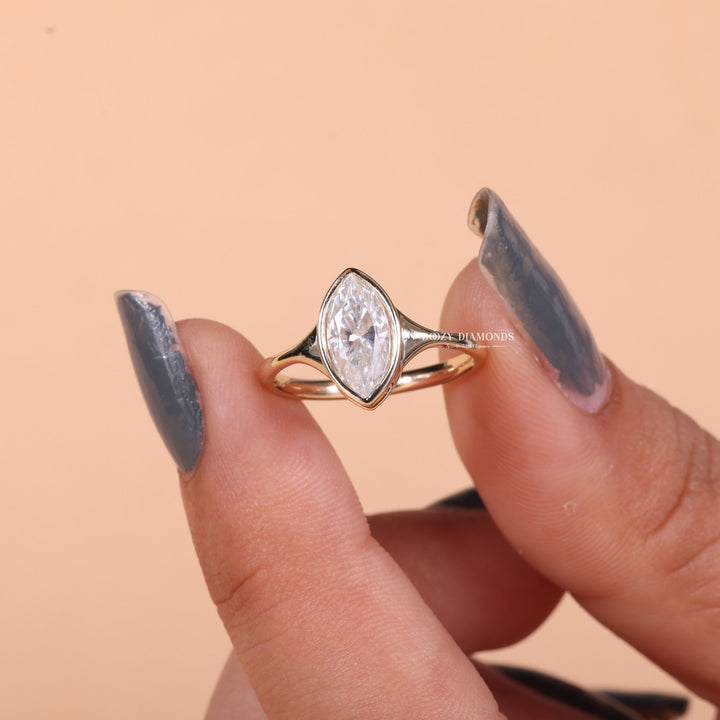 Marquise bezel engagement ring photographed in natural light