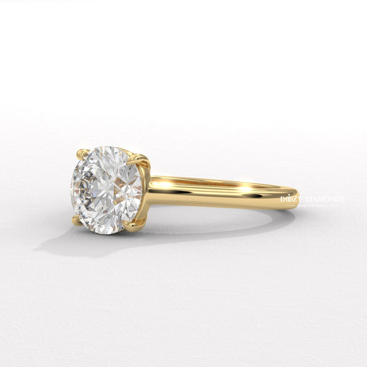Round cut engagement ring side view showing band detail