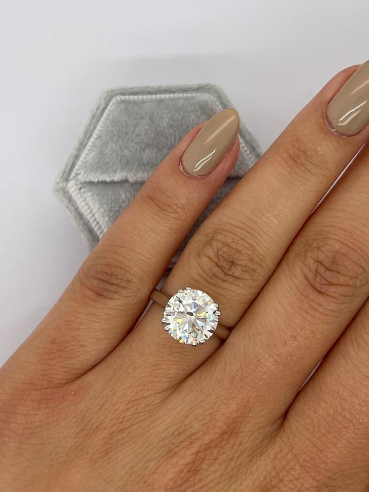 Premium round cut solitaire engagement ring crafted in solid gold