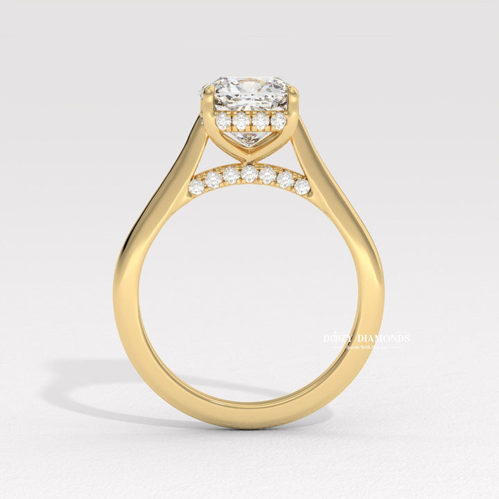 Cushion cut diamond ring worn on hand
