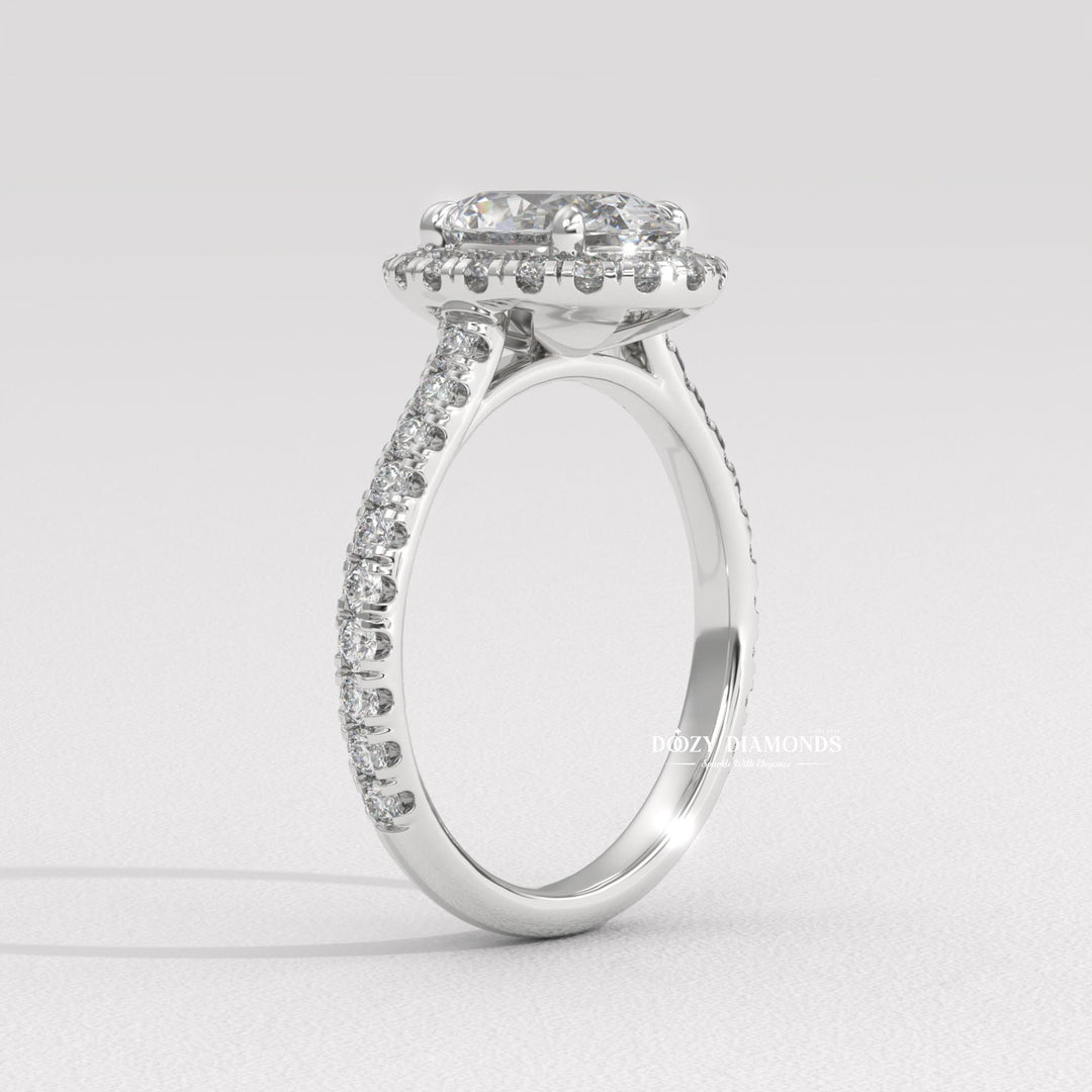 Certified oval cut diamond featured in halo engagement ring
