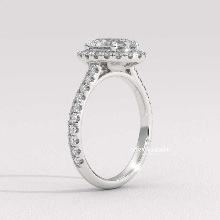 Certified oval cut diamond featured in halo engagement ring