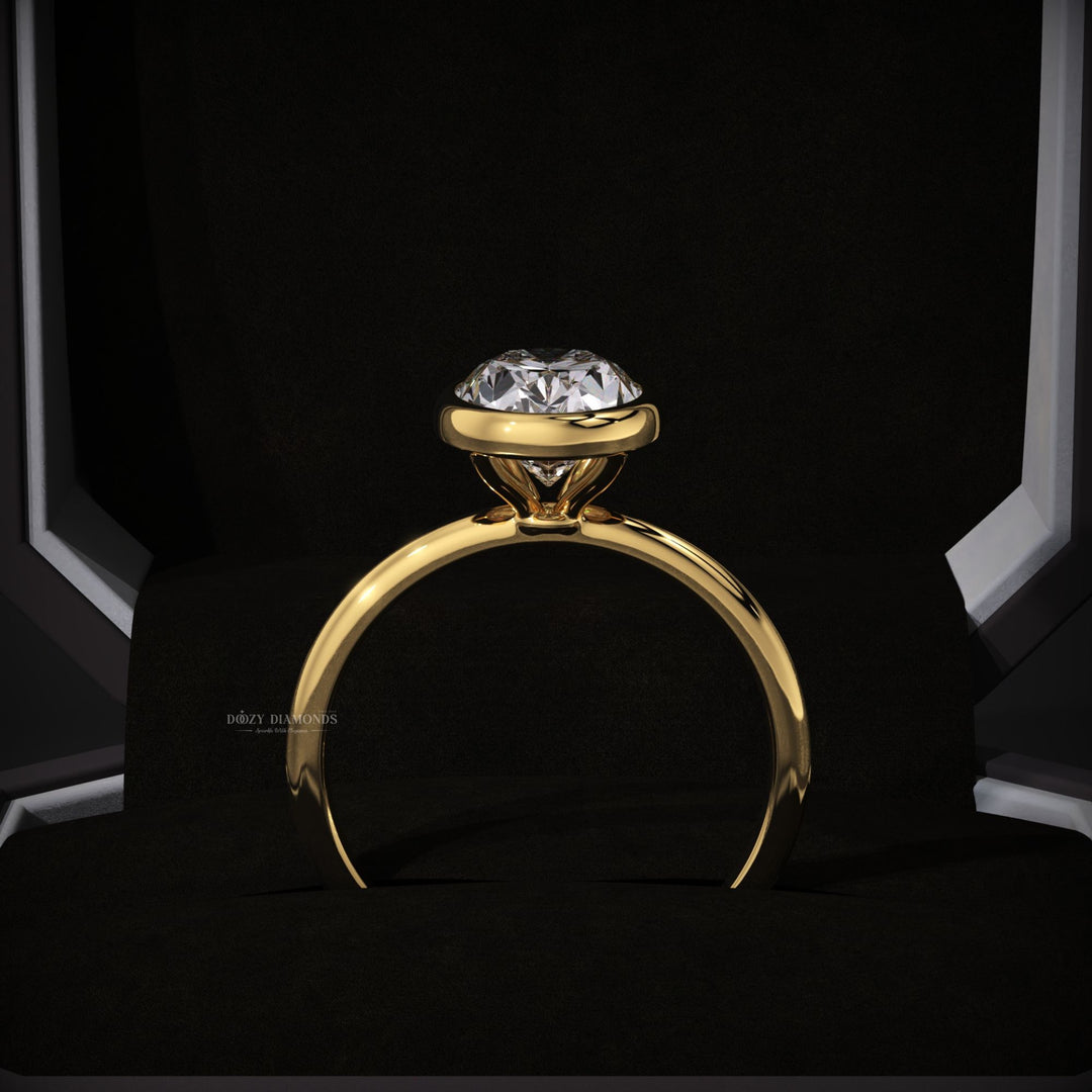 Oval cut bezel engagement ring with IGI certified center diamond