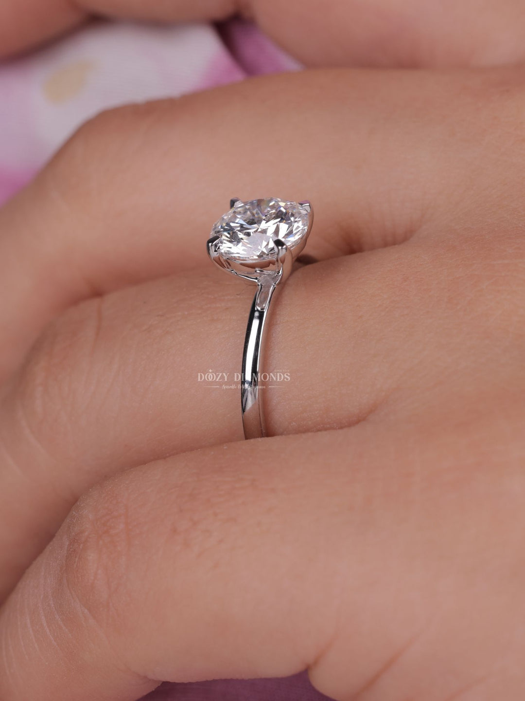 Macro shot of round cut diamond facets in solitaire ring setting