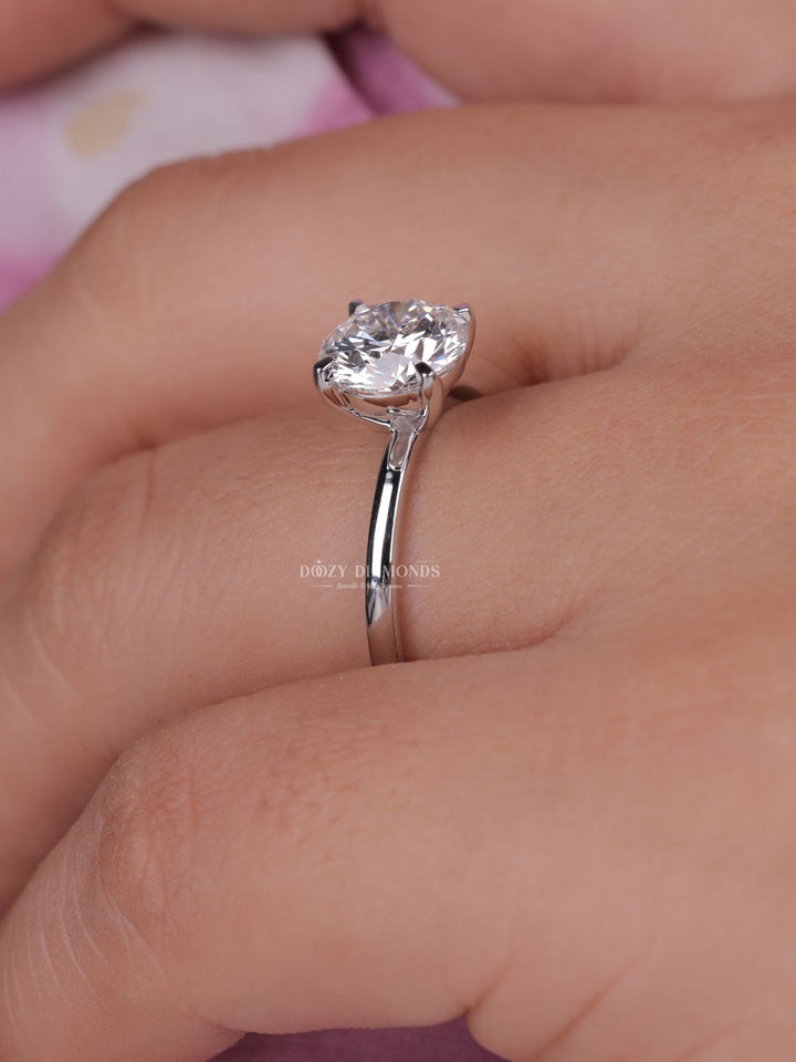 Macro shot of round cut diamond facets in solitaire ring setting