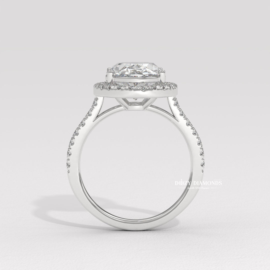 Certified oval cut diamond featured in halo engagement ring