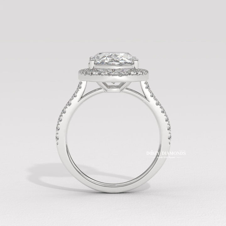 Certified oval cut diamond featured in halo engagement ring