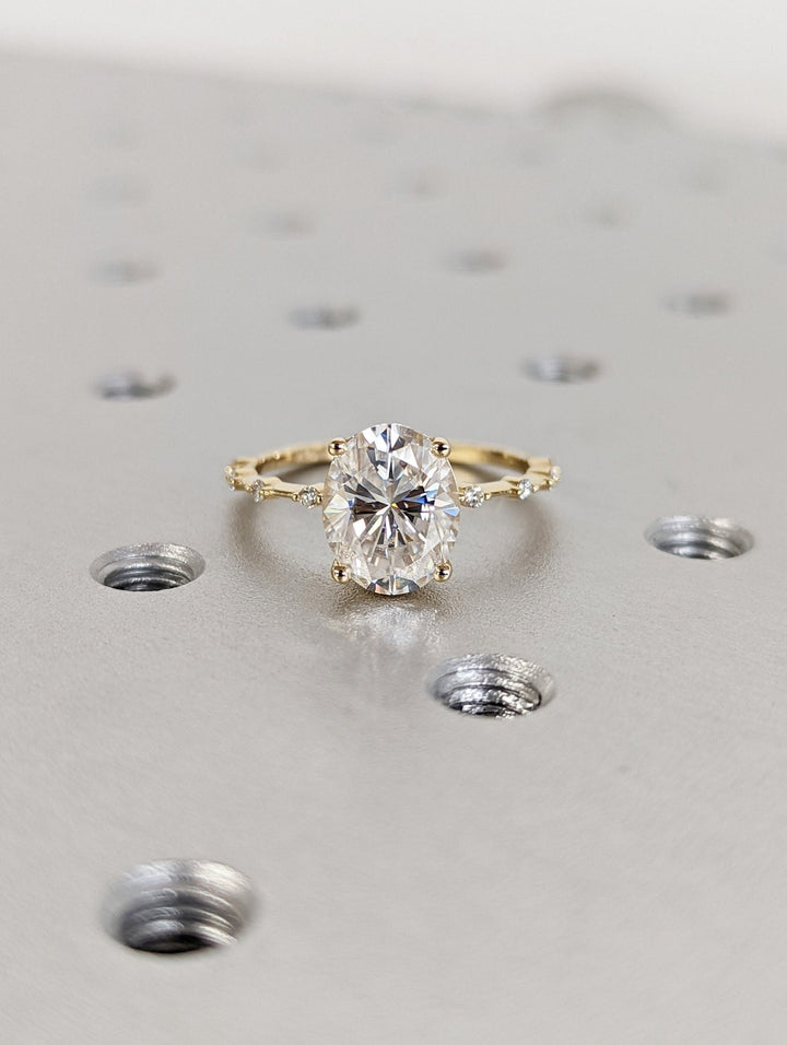 Shop the oval cut pave engagement ring collection online