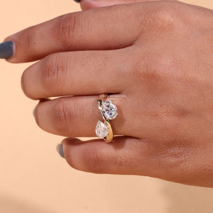 Oval solitaire engagement ring photographed in natural light