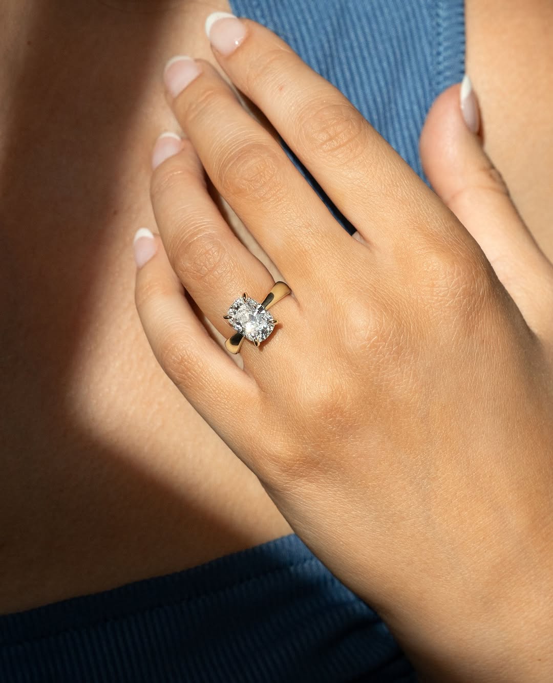 Cushion split shank lab grown diamond ring side profile in gold setting