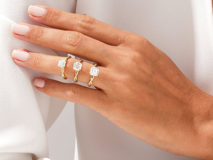Asscher solitaire diamond ring presented in signature gift packaging