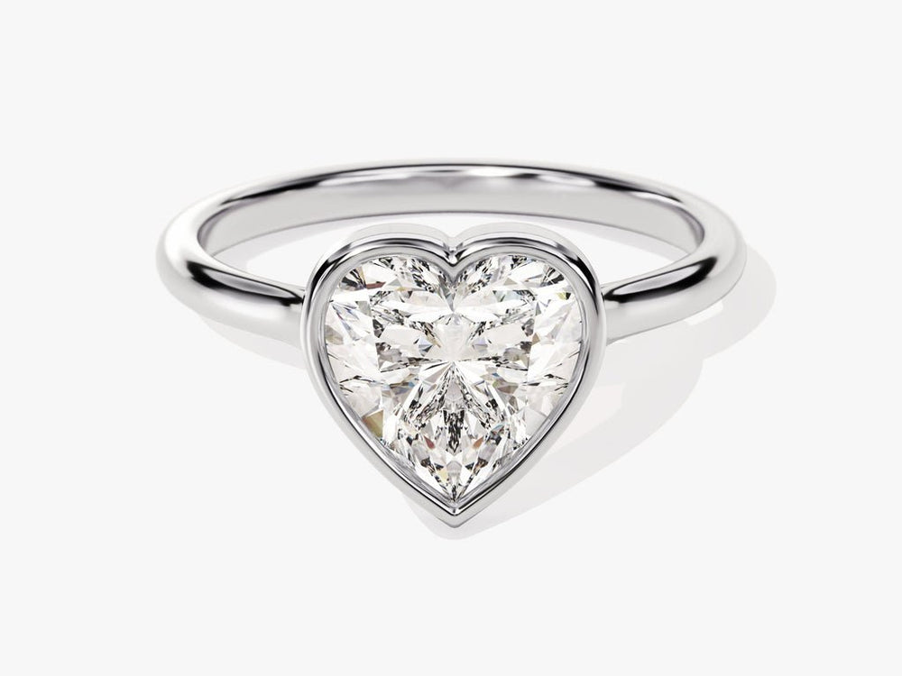 Heart bezel engagement ring finished in polished solid gold