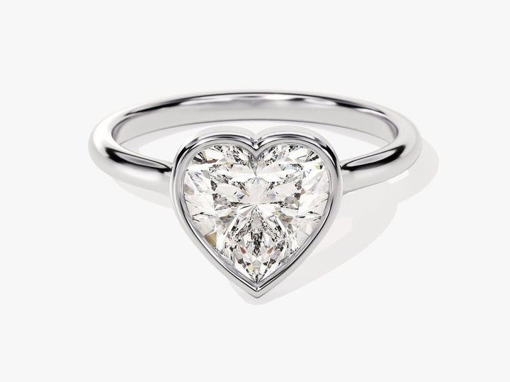 Heart bezel engagement ring finished in polished solid gold