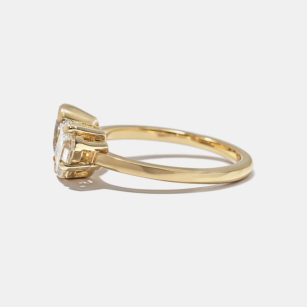 Oval cut diamond ring worn on hand