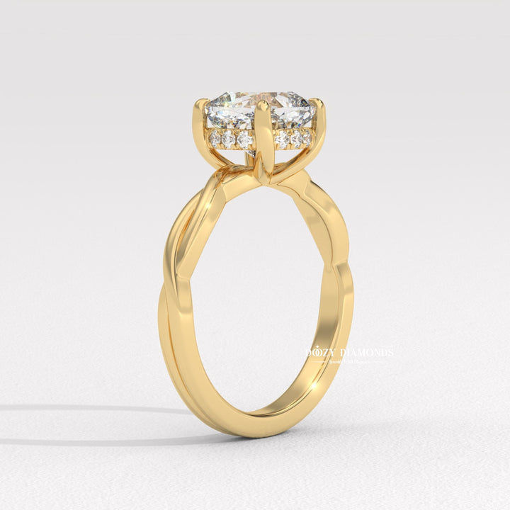 Macro shot of cushion cut diamond facets in solitaire ring setting