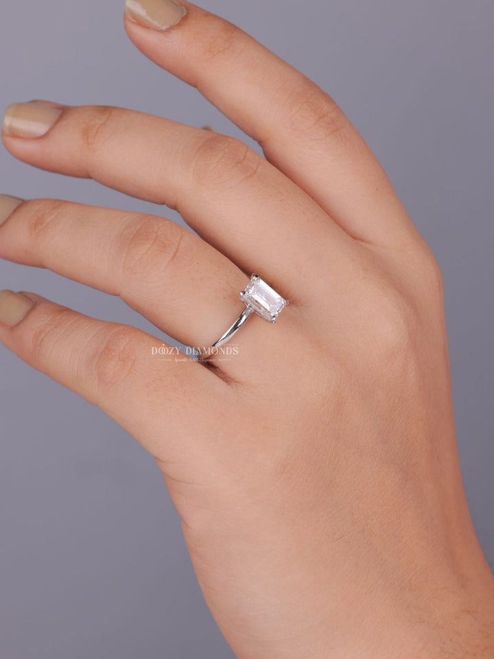 Emerald solitaire lab grown diamond ring side profile in gold setting