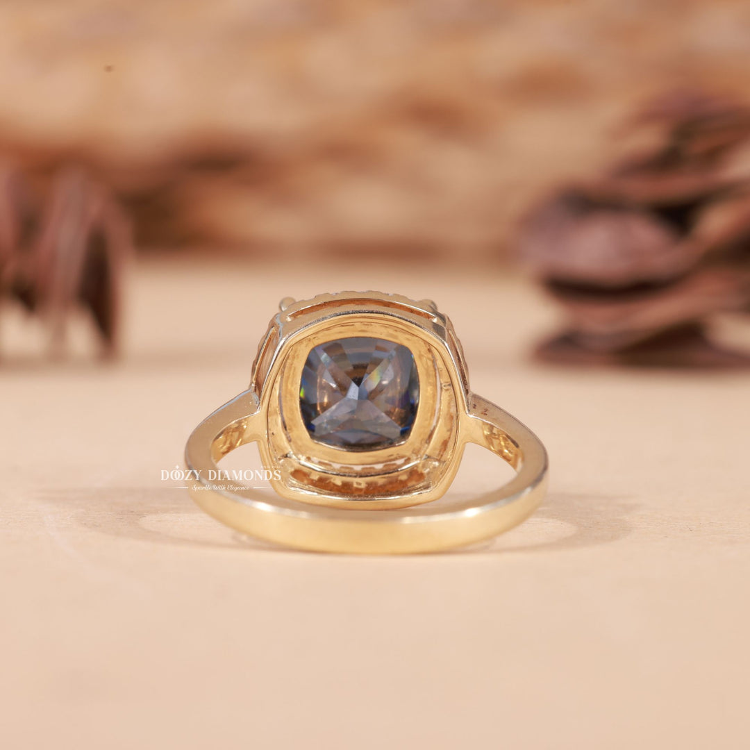 Cushion halo engagement ring viewed from the side
