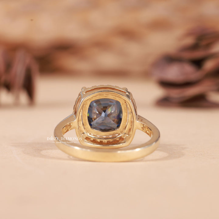 Cushion halo engagement ring viewed from the side