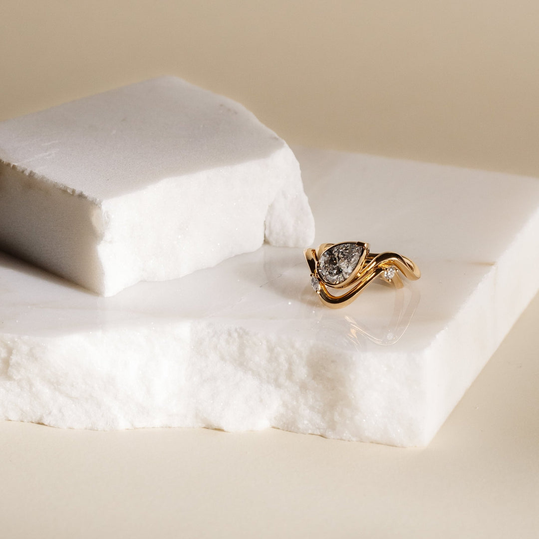 Pear solitaire engagement ring with certified lab grown diamond