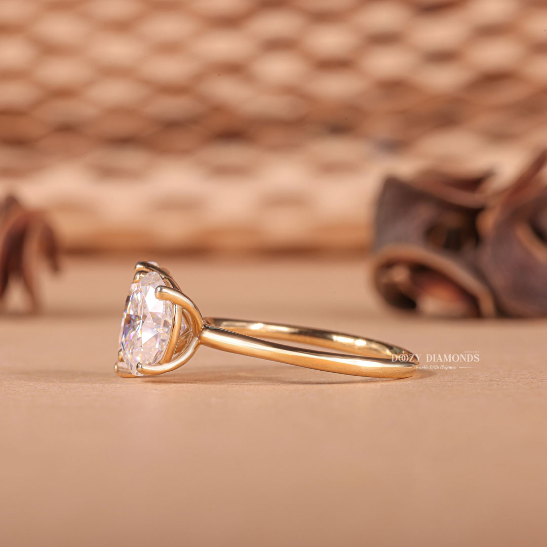 Fine craftsmanship detail on oval solitaire engagement ring