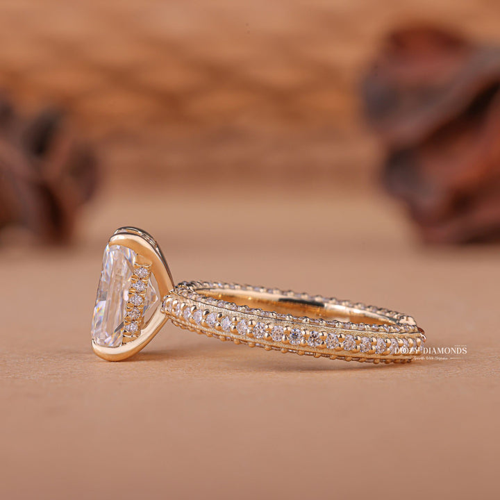 Macro shot of radiant cut diamond facets in pave ring setting