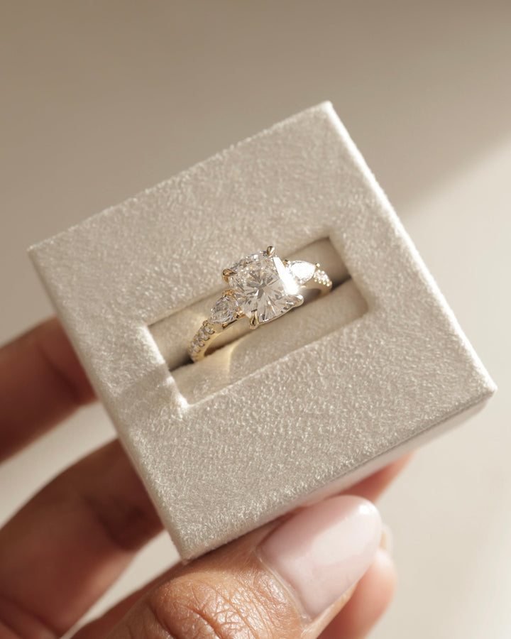 continuous sparkle setting, radiant band setting, glitter band setting, open gallery three stone setting, closed gallery three stone setting, double prong three stone setting, single prong three stone setting, hidden prong setting, modern prong setting, vintage inspired pave setting, architectural pave setting
