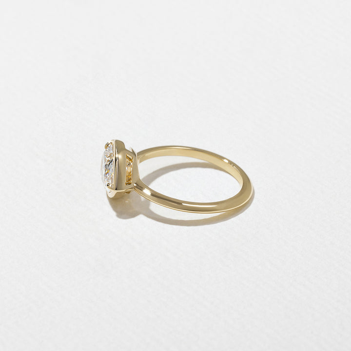 1.0CT Bezel Set Pear E - VS Lab Grown Diamond Ring With Unique Curved Band - Doozy Diamonds