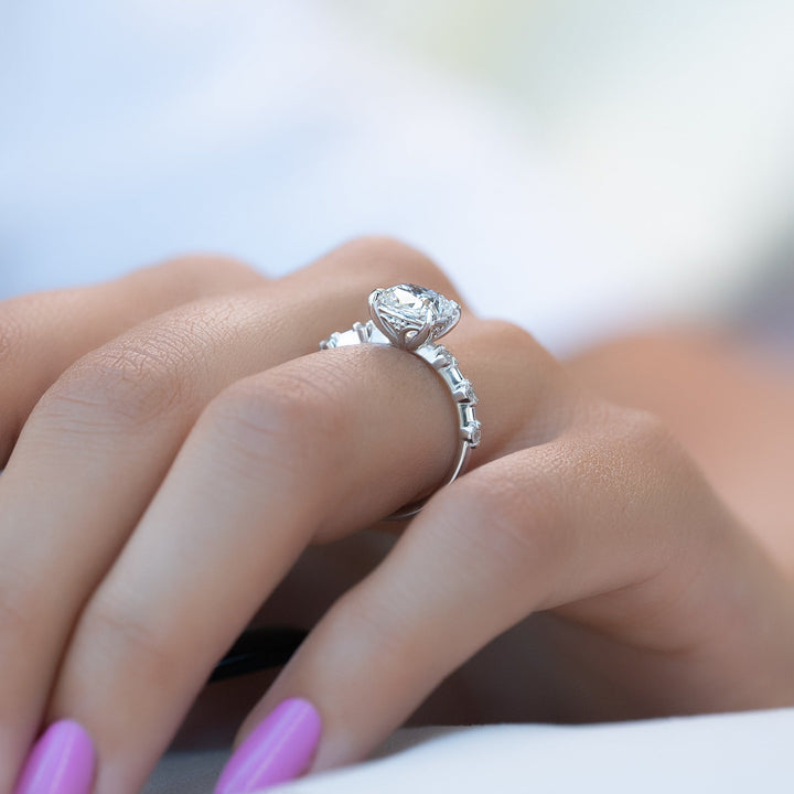 Cushion solitaire engagement ring offered in gold and platinum