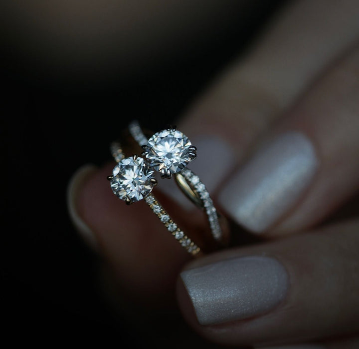 Profile view of round cut solitaire engagement ring band