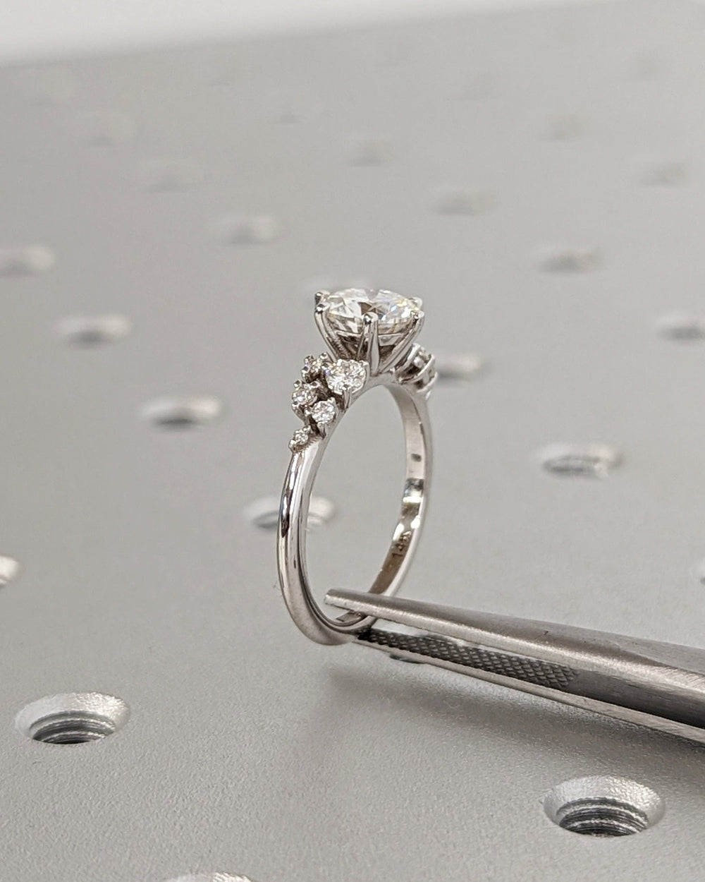 Round cluster engagement ring with brilliant diamond sparkle