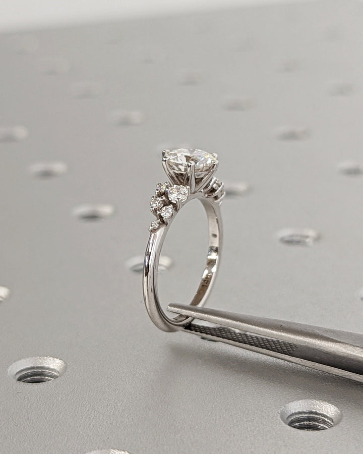 Round cluster engagement ring with brilliant diamond sparkle