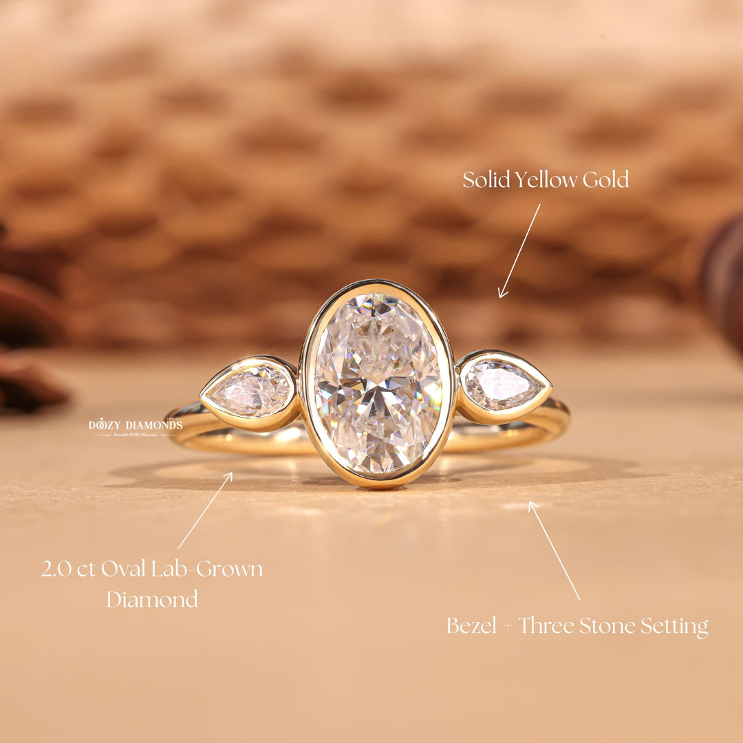 Oval bezel diamond engagement ring available in multiple metals