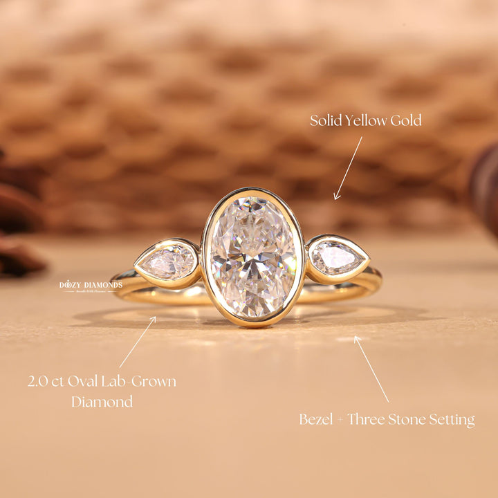 Oval bezel diamond engagement ring available in multiple metals