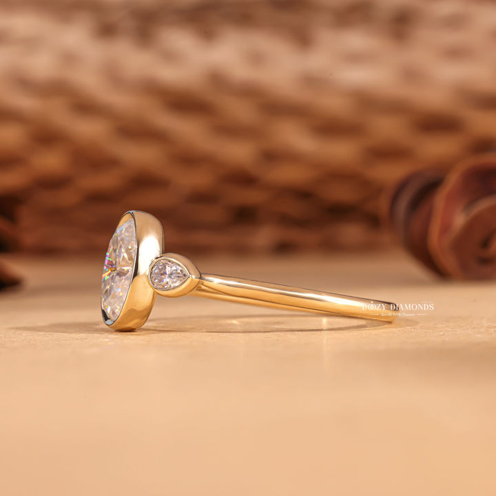 Oval bezel ring set with an IGI graded diamond