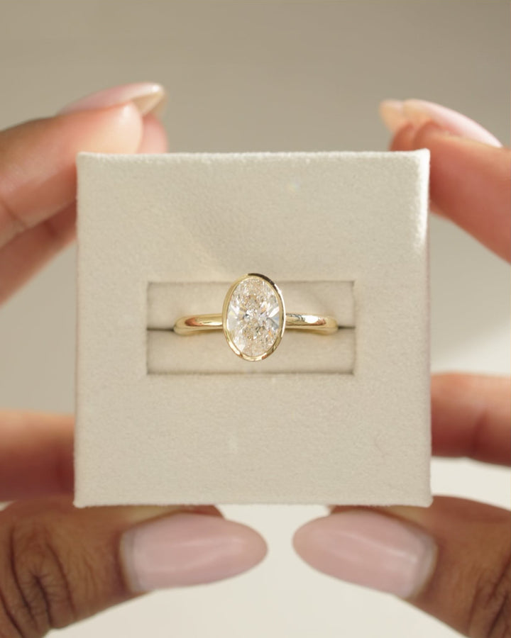 secure bezel setting, polished bezel setting, smooth bezel setting, clean bezel setting, contemporary bezel setting, elegant bezel setting, low profile bezel setting, high polish