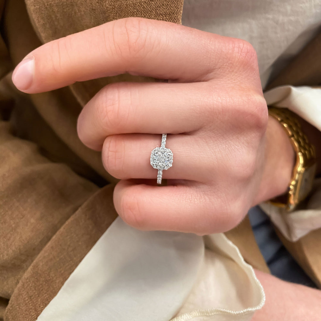 Side angle of cushion pave diamond engagement ring