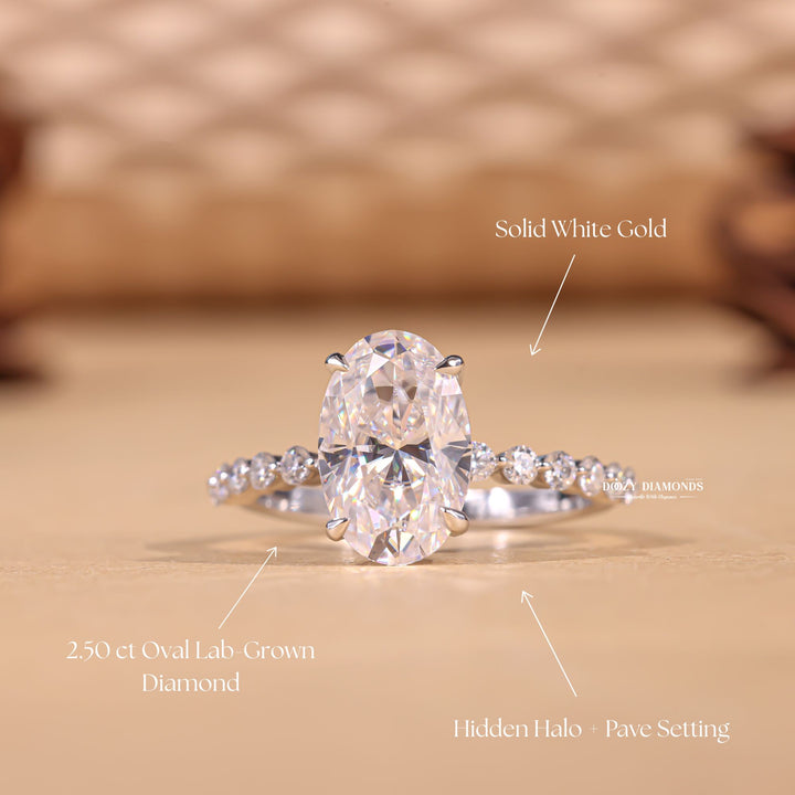 Profile view of oval cut hidden halo engagement ring band