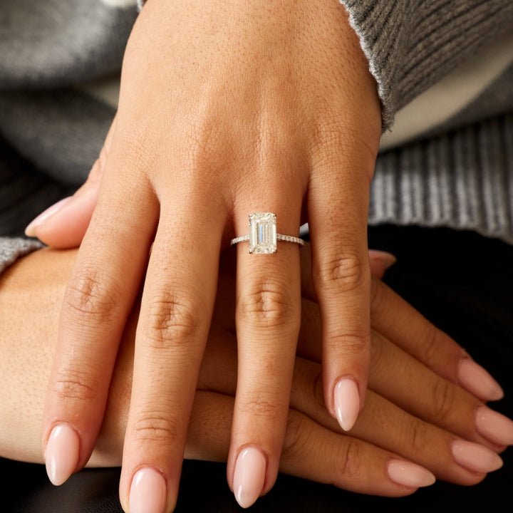 Emerald pave engagement ring with brilliant diamond sparkle