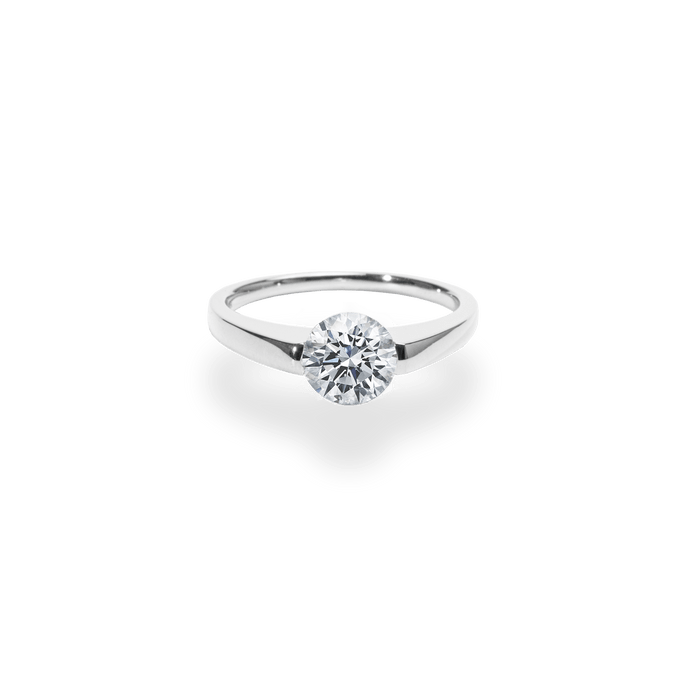 IGI certified round cut diamond in solitaire engagement ring setting
