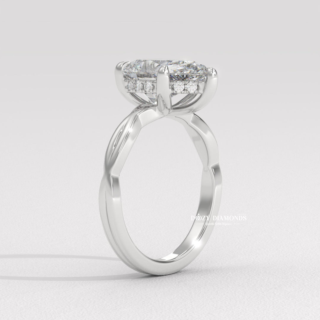 Pear solitaire lab grown diamond ring fitted on finger
