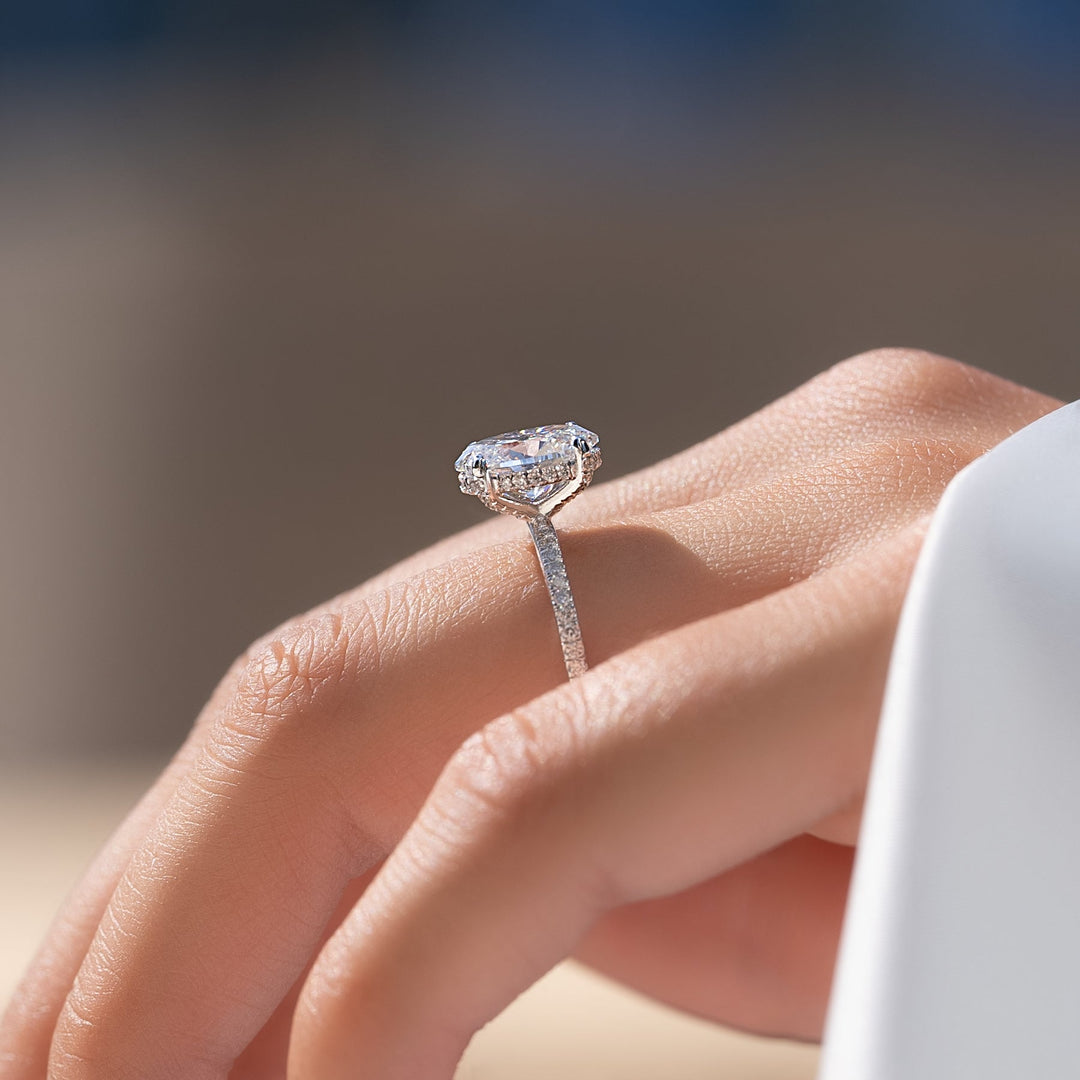 Oval hidden halo engagement ring with IGI certificate and packaging