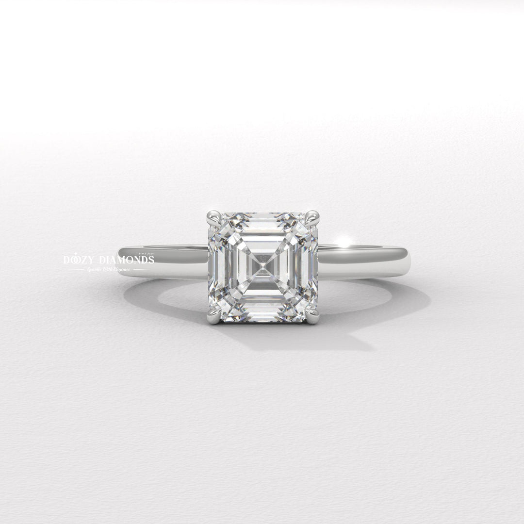 Asscher hidden halo engagement ring photographed in natural light