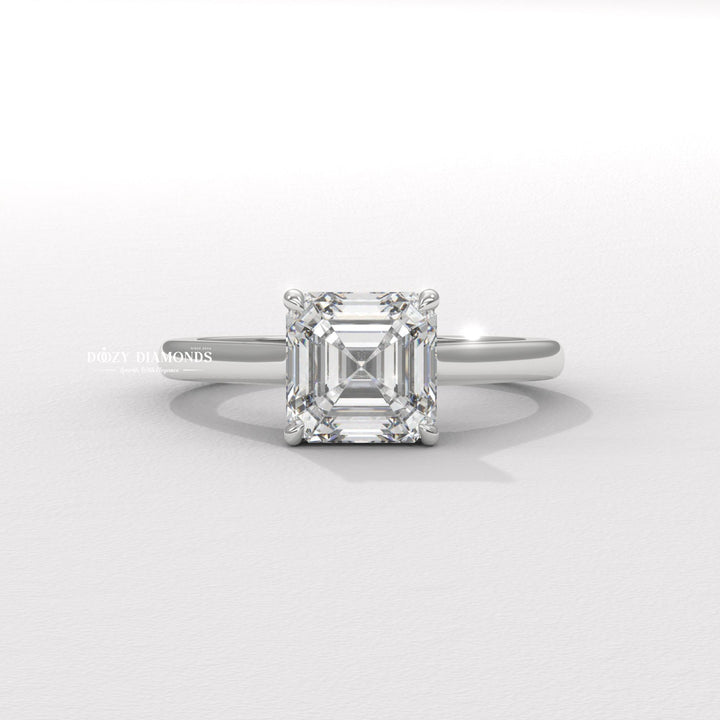 Asscher hidden halo engagement ring photographed in natural light