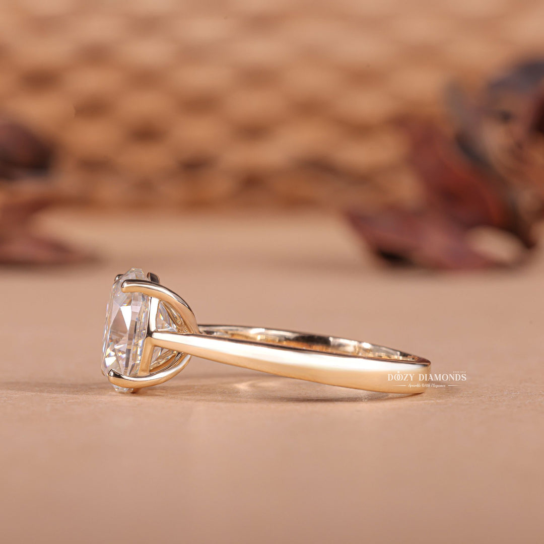 Macro shot of oval cut diamond facets in solitaire ring setting