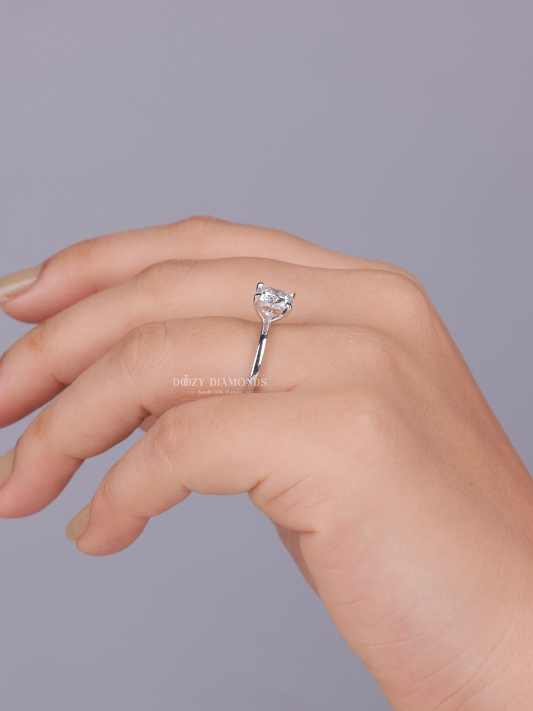 Top-down view of cushion cut solitaire engagement ring