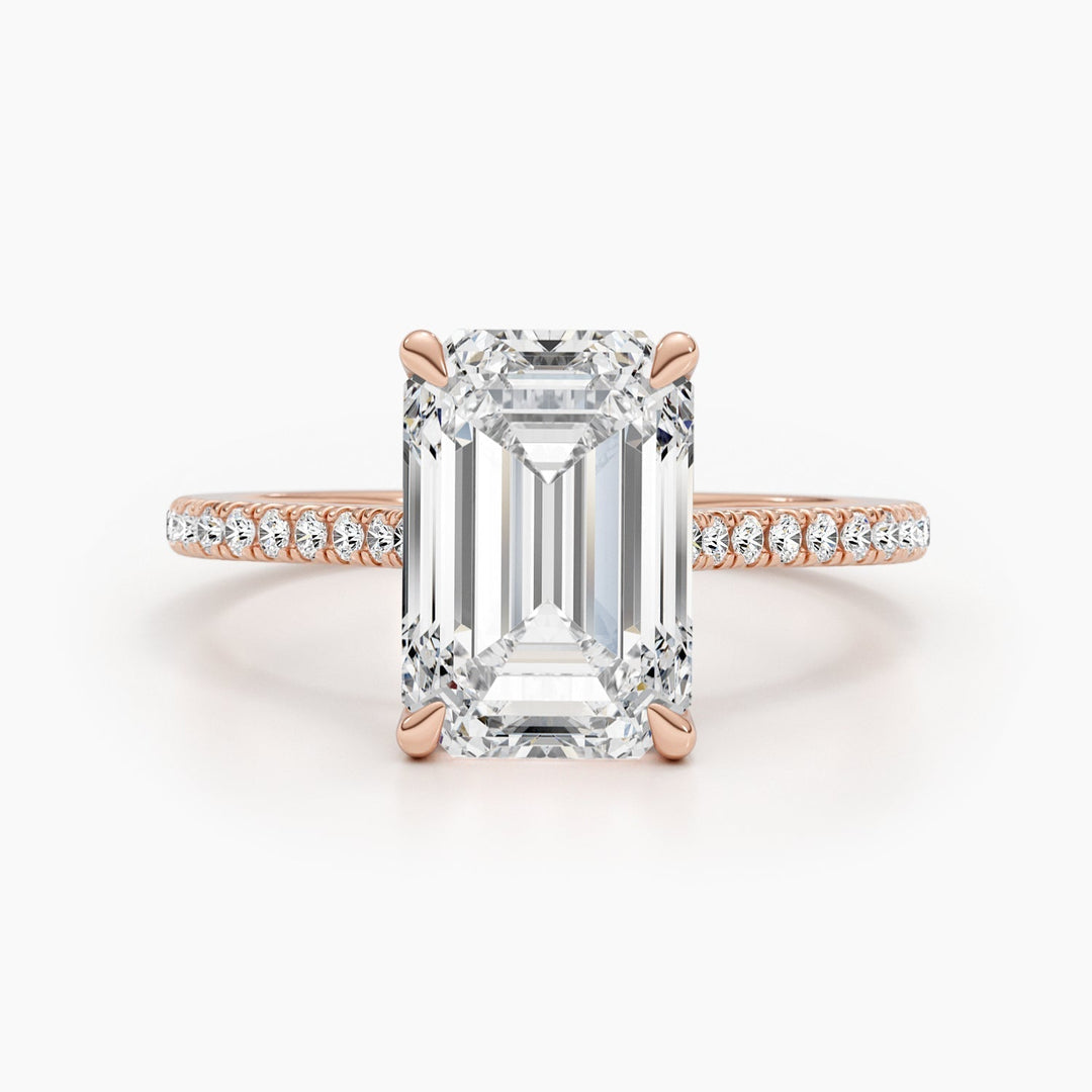 Top-down view of emerald cut pave engagement ring
