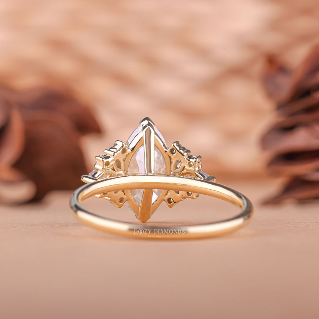 Lifestyle shot of marquise cluster diamond ring on hand