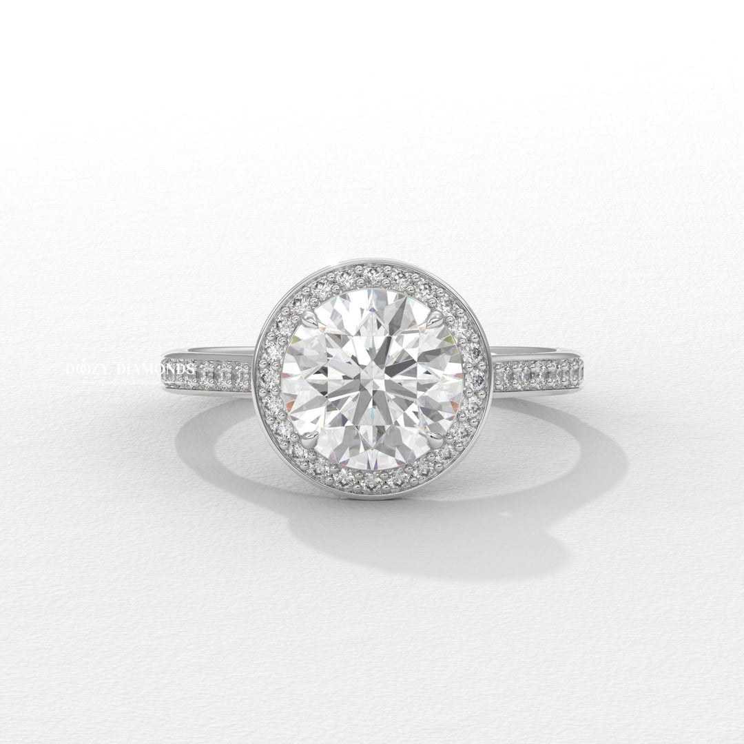 Round pave diamond ring presented in signature gift packaging
