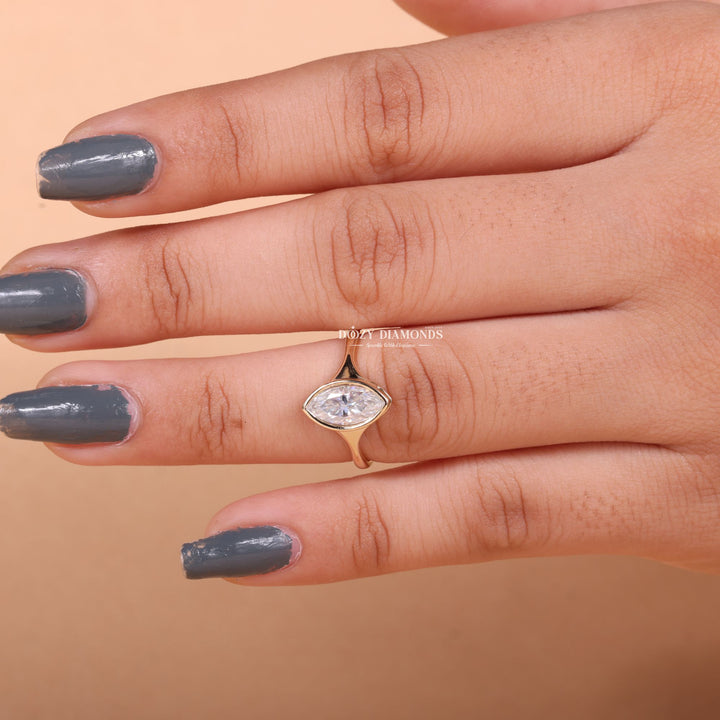 Classic marquise bezel engagement ring crafted for everyday wear