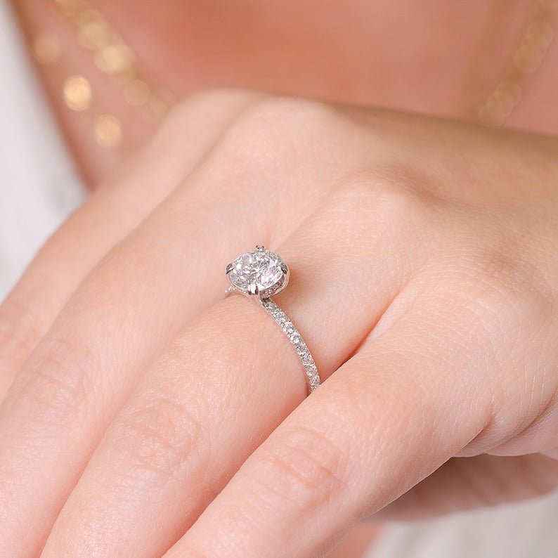 Angled view of round cut diamond in hidden halo setting